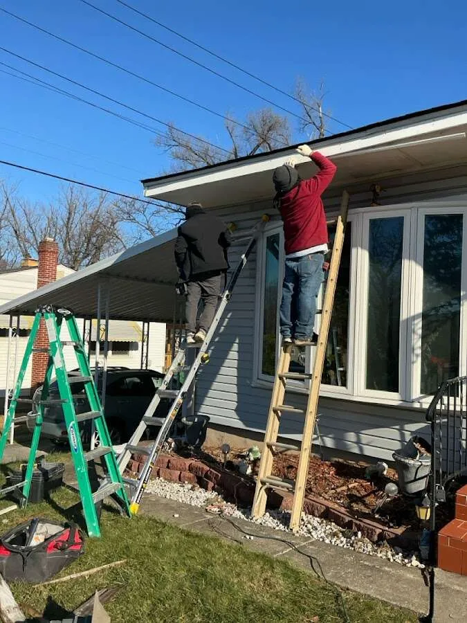 Restoration crew performing exterior repair in Elsmere