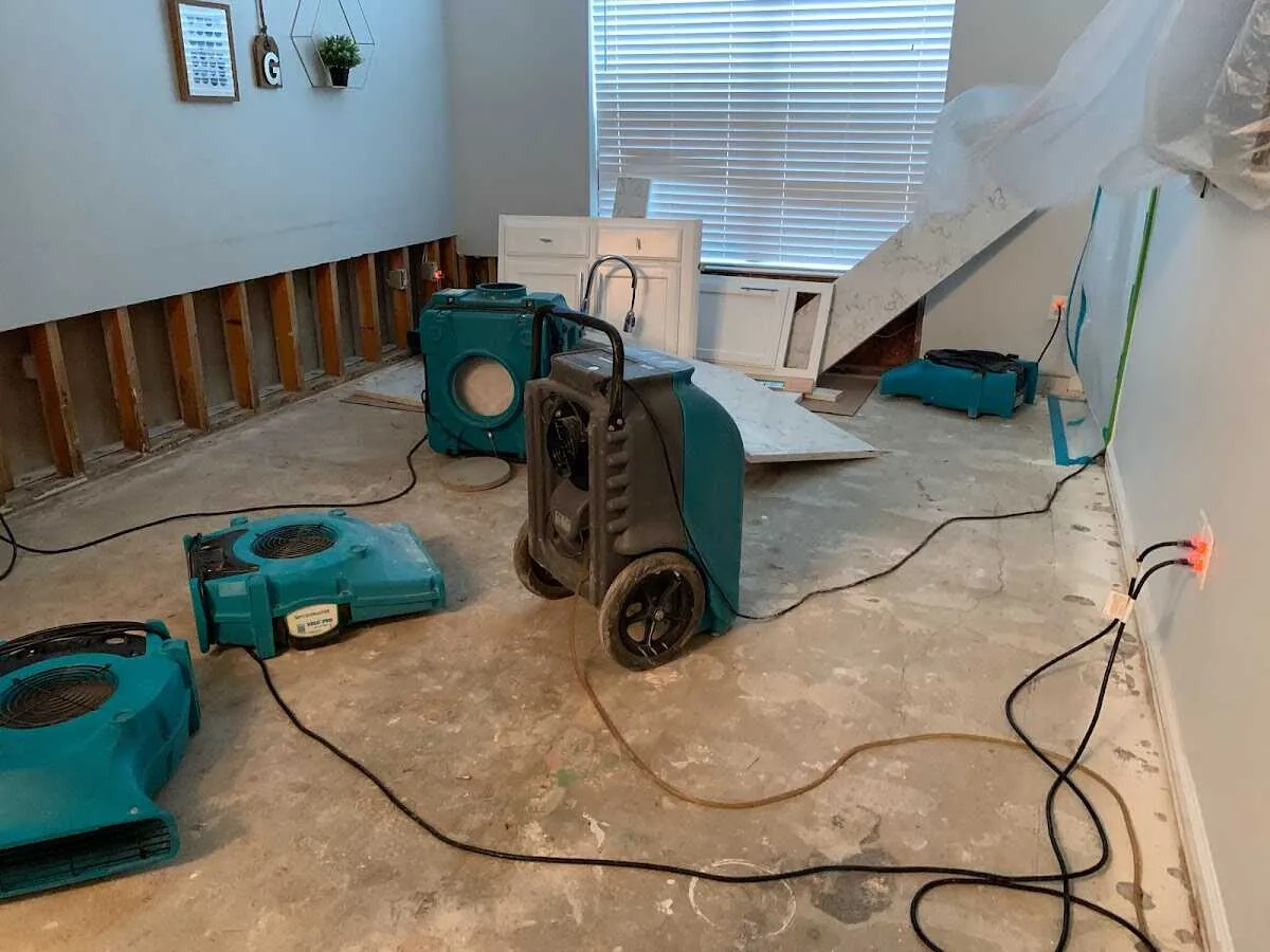 Dehumidifier in flood-cut room for Water Damage Restoration in Elsmere